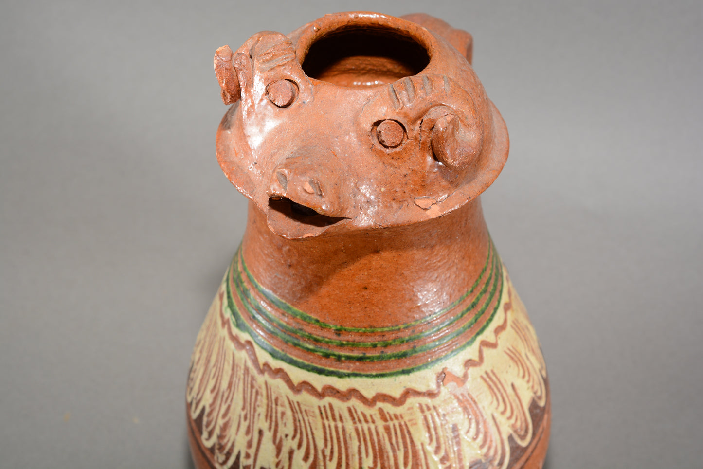 Vintage anthropomorphic slipware pottery jug