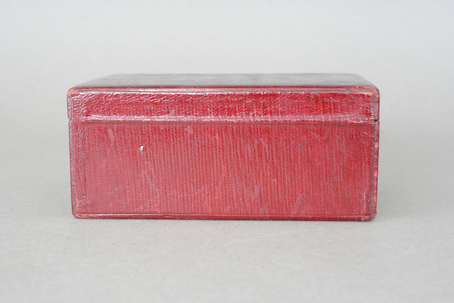 Small Edwardian red leather money box