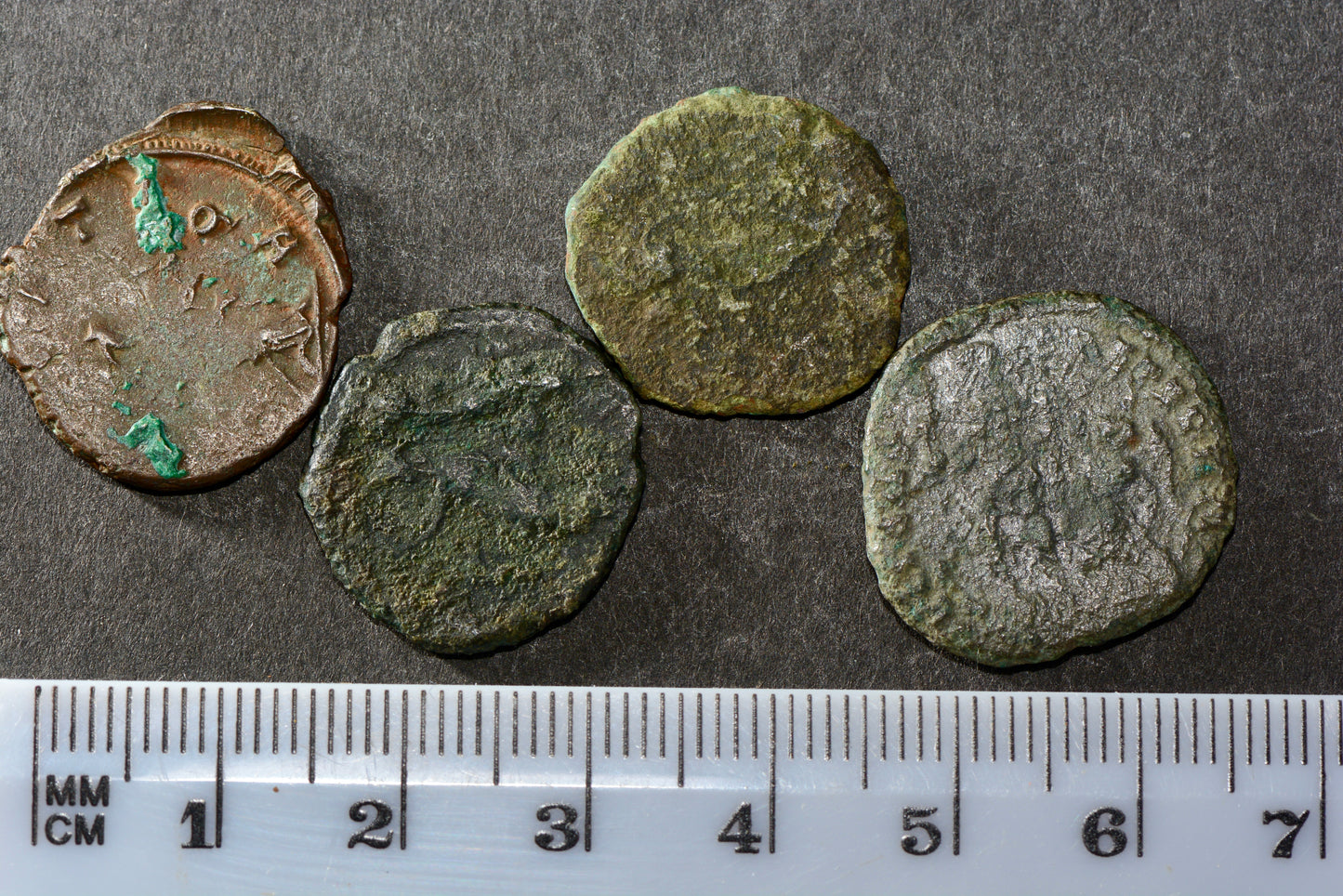 Four ancient Roman bronze coins M12