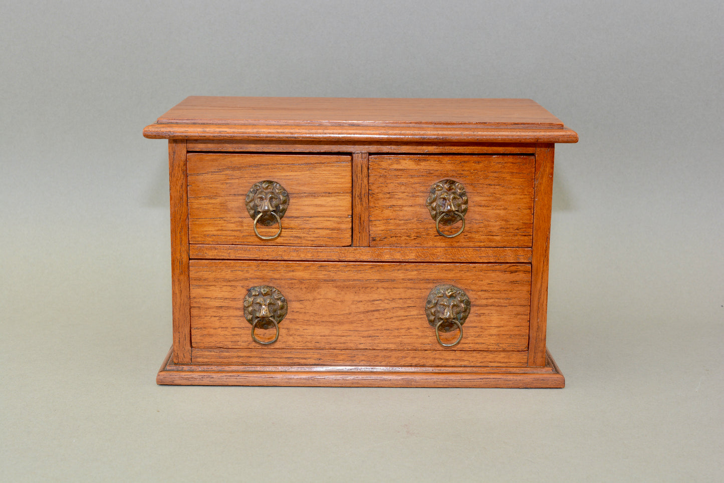 Edwardian oak miniature chest of drawers