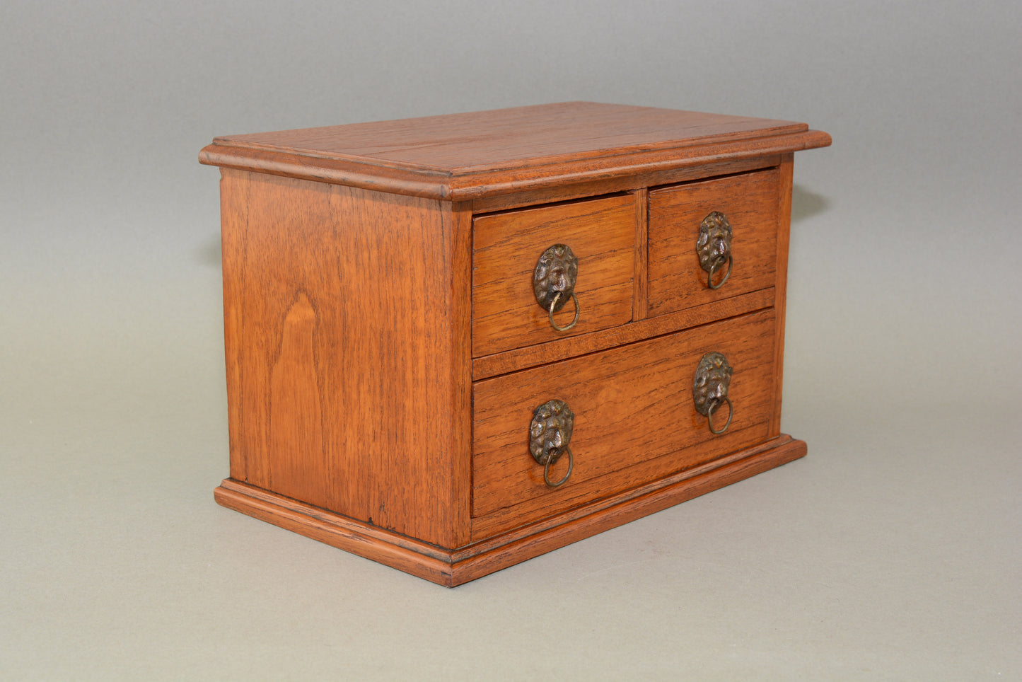Edwardian oak miniature chest of drawers