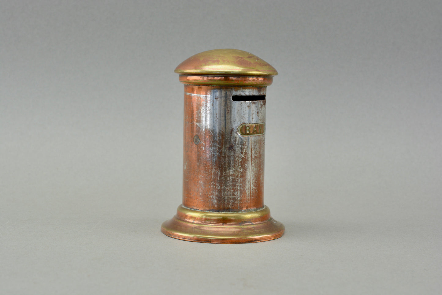 English brass money box coin bank