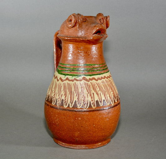 Vintage anthropomorphic slipware pottery jug