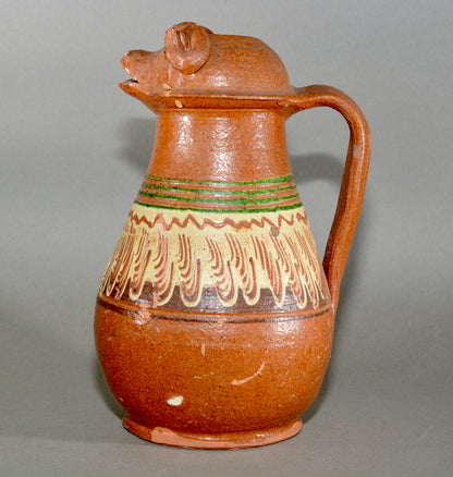 Vintage anthropomorphic slipware pottery jug