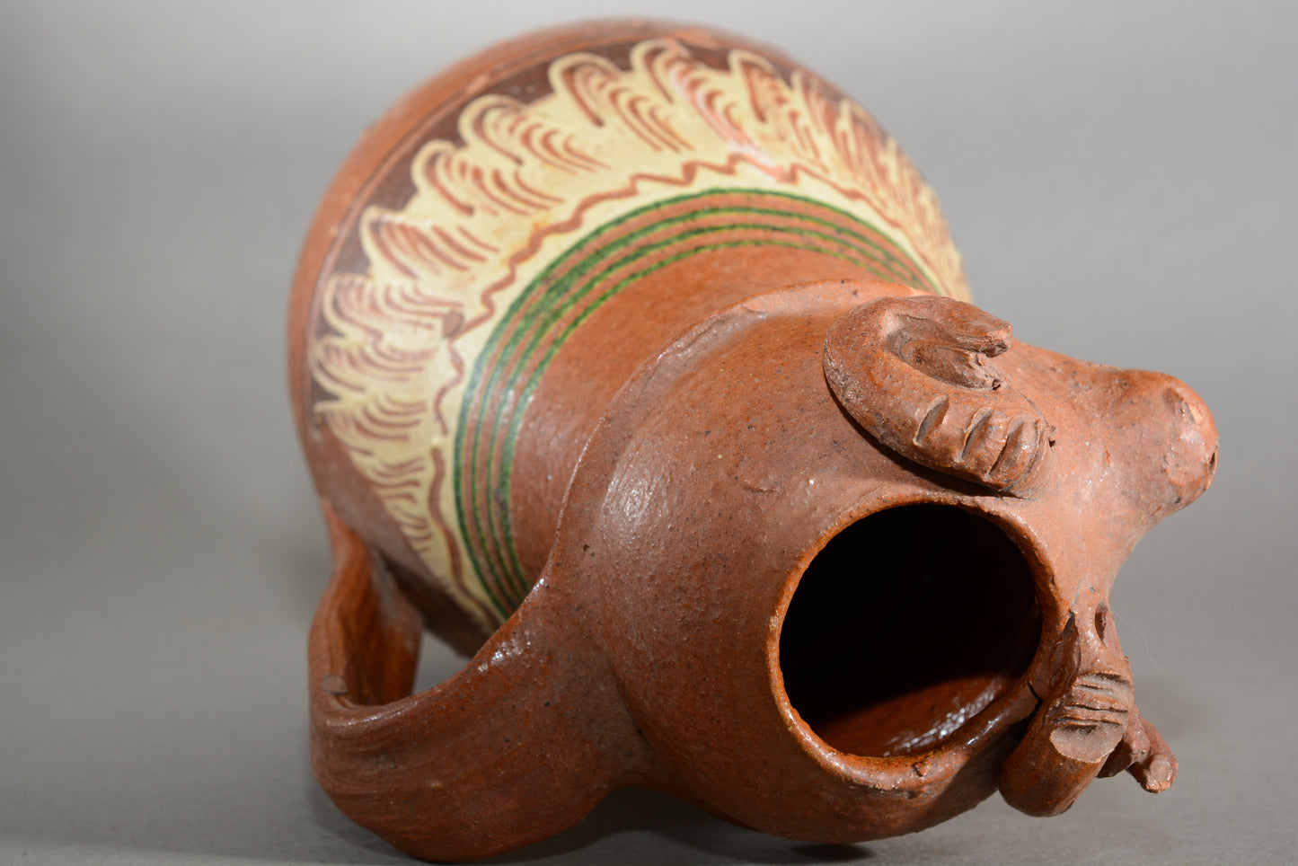 Vintage anthropomorphic slipware pottery jug