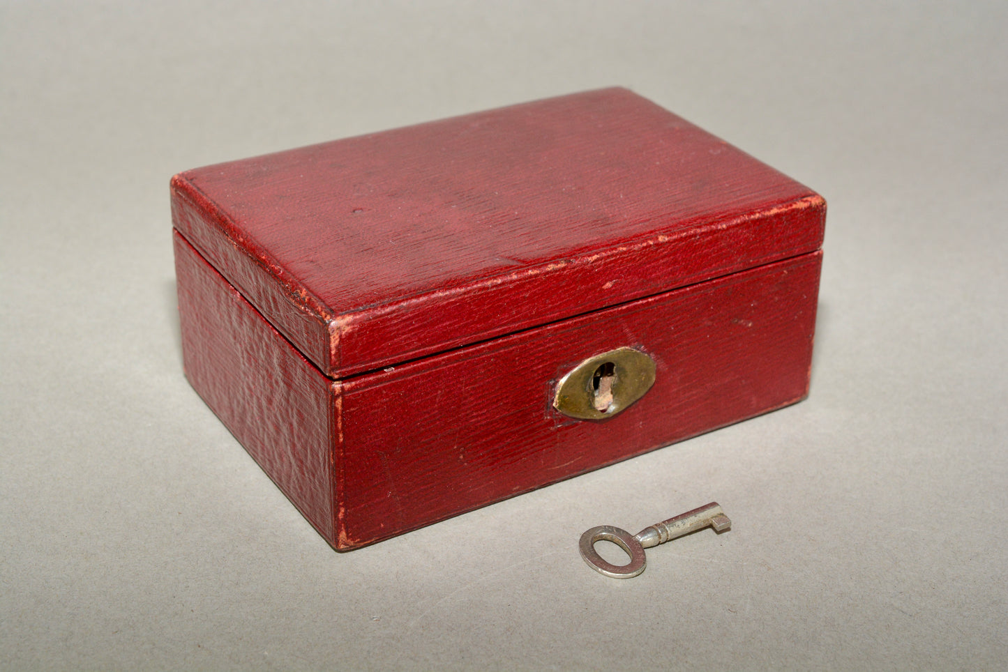 Small Edwardian red leather money box