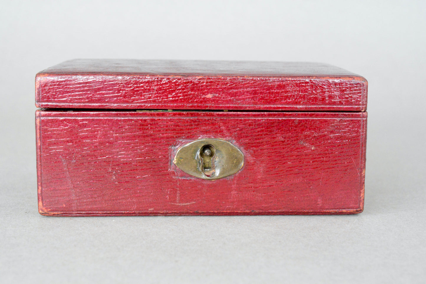 Small Edwardian red leather money box