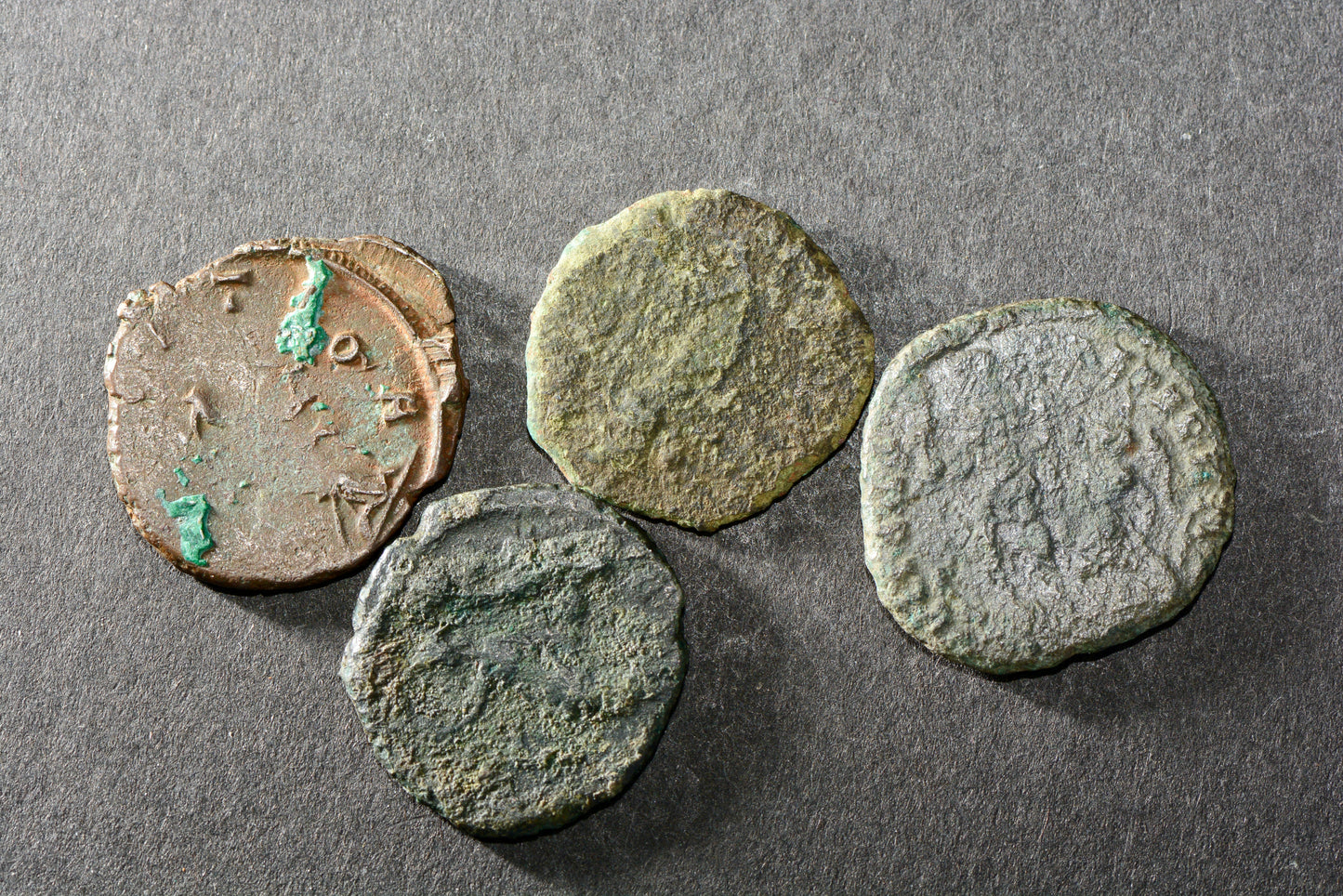 Four ancient Roman bronze coins M12