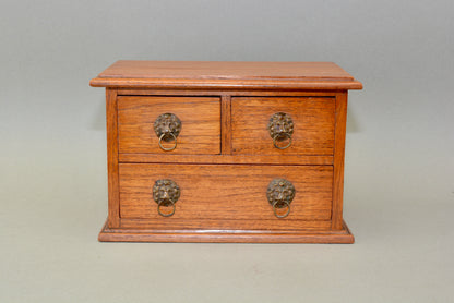 Edwardian oak miniature chest of drawers