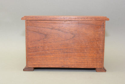 Edwardian oak miniature chest of drawers