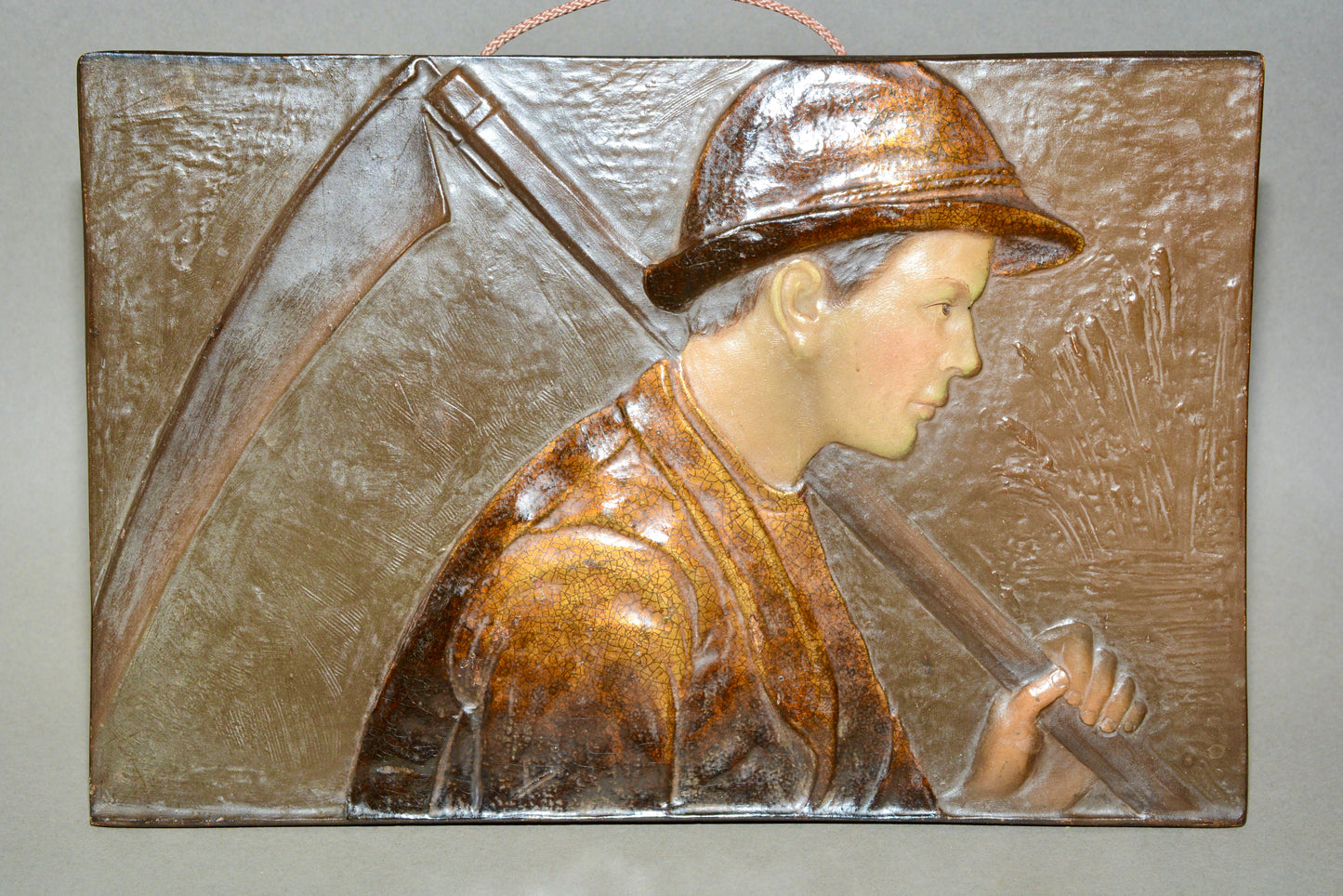 French pottery wall panel young peasant farm worker