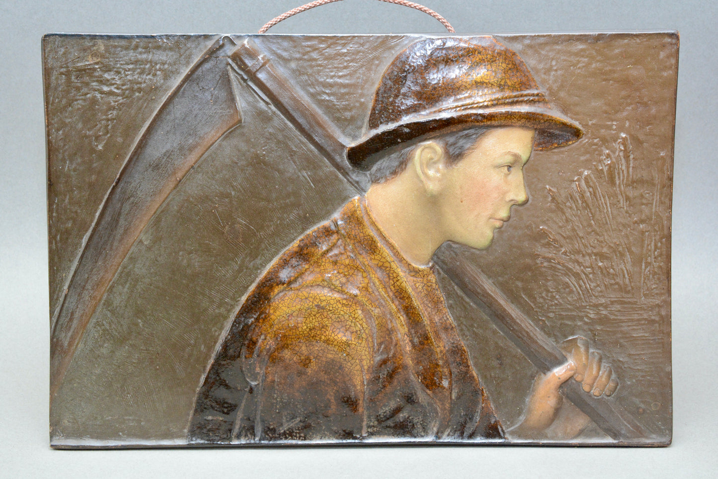 French pottery wall panel young peasant farm worker