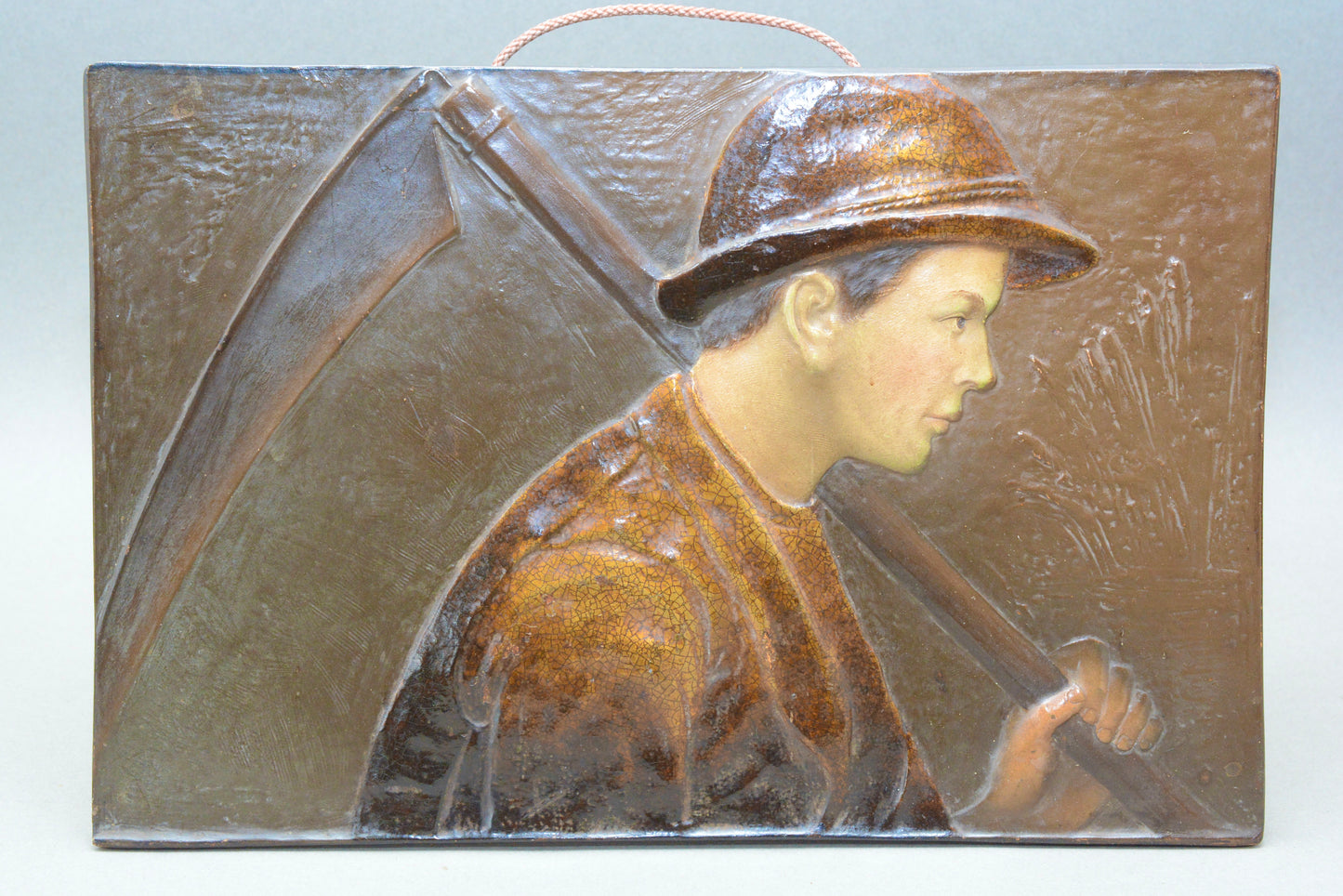 French pottery wall panel young peasant farm worker